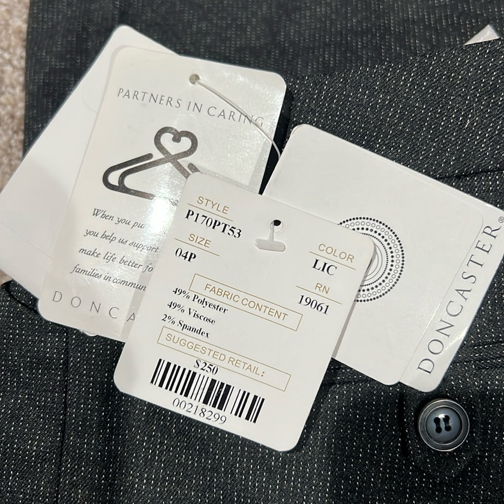 I am selling a brand new pair of don caster dress pants. Size 4p.